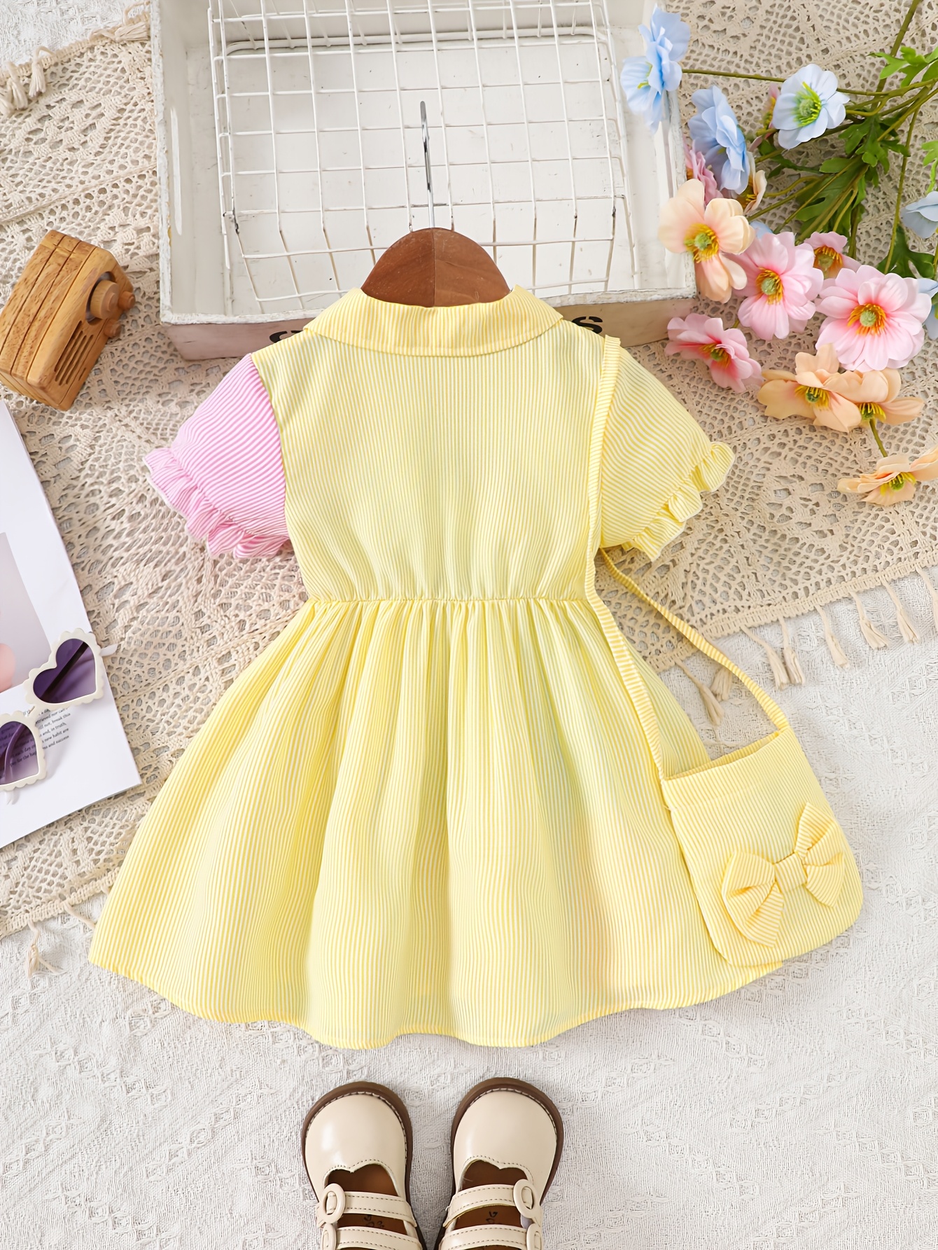 A Cute And Loose Summer Dress for Baby Girls Featuring Colorful Stripes And a Contrasting Design, Paired with a Bow Bag, Perfect for Vacation Relaxation And Everyday Wear – Image 5