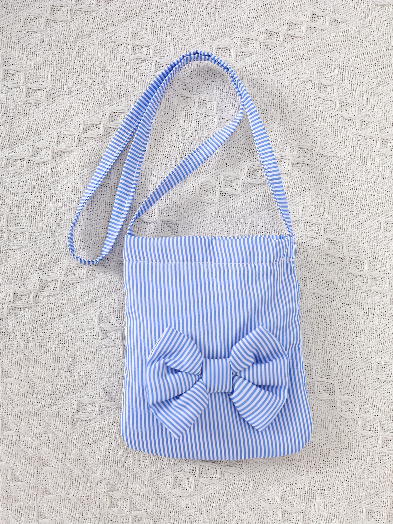 A Cute And Loose Summer Dress for Baby Girls Featuring Colorful Stripes And a Contrasting Design, Paired with a Bow Bag, Perfect for Vacation Relaxation And Everyday Wear – Image 22