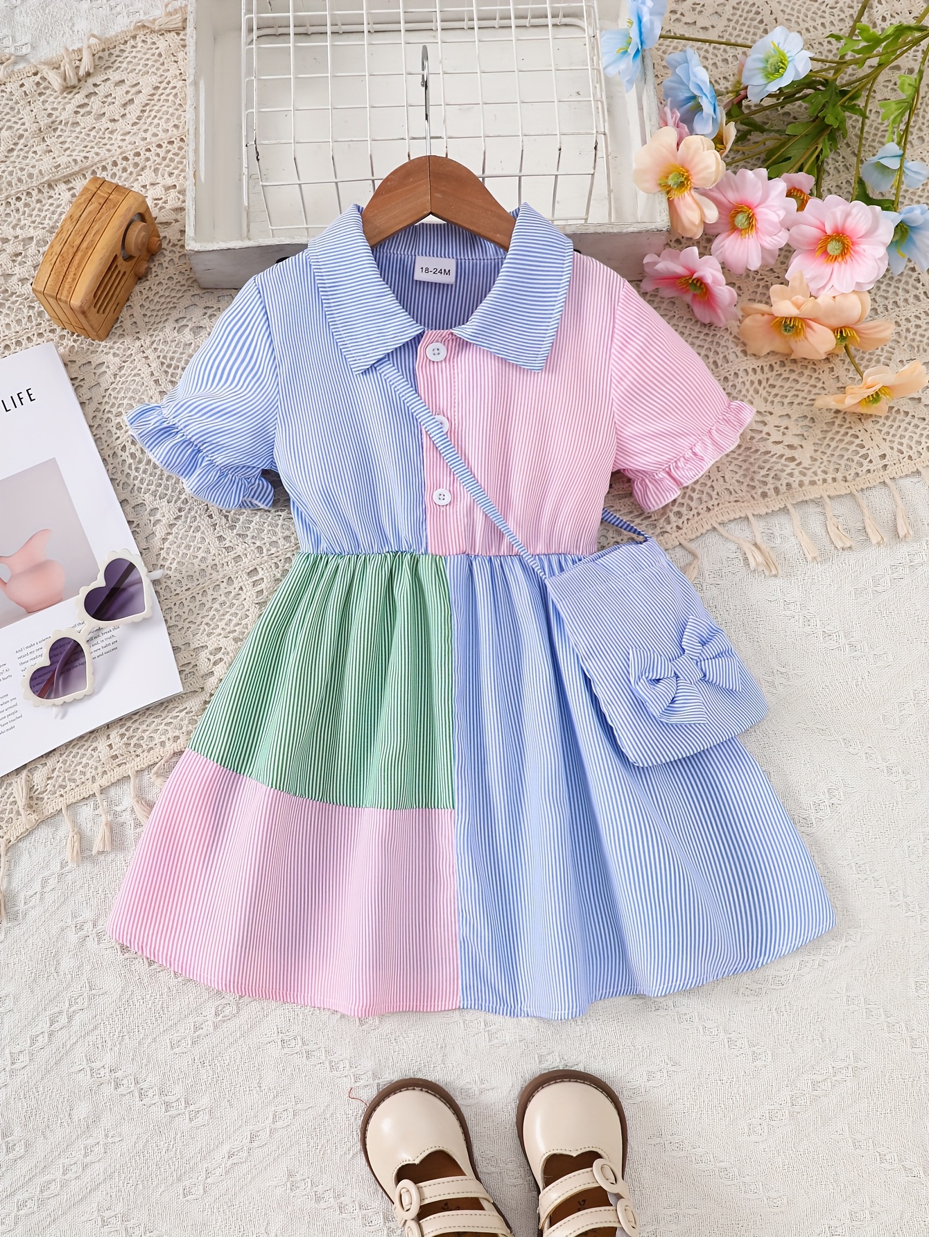 A Cute And Loose Summer Dress for Baby Girls Featuring Colorful Stripes And a Contrasting Design, Paired with a Bow Bag, Perfect for Vacation Relaxation And Everyday Wear – Image 2