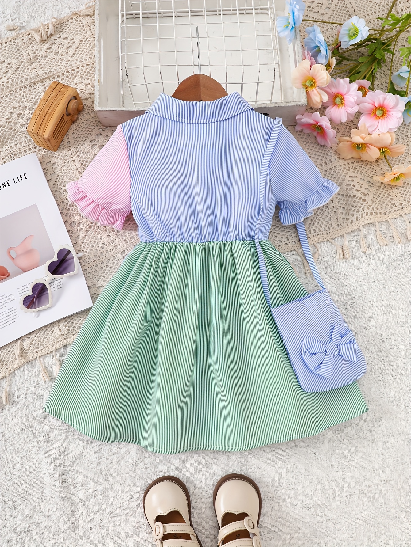 A Cute And Loose Summer Dress for Baby Girls Featuring Colorful Stripes And a Contrasting Design, Paired with a Bow Bag, Perfect for Vacation Relaxation And Everyday Wear – Image 4